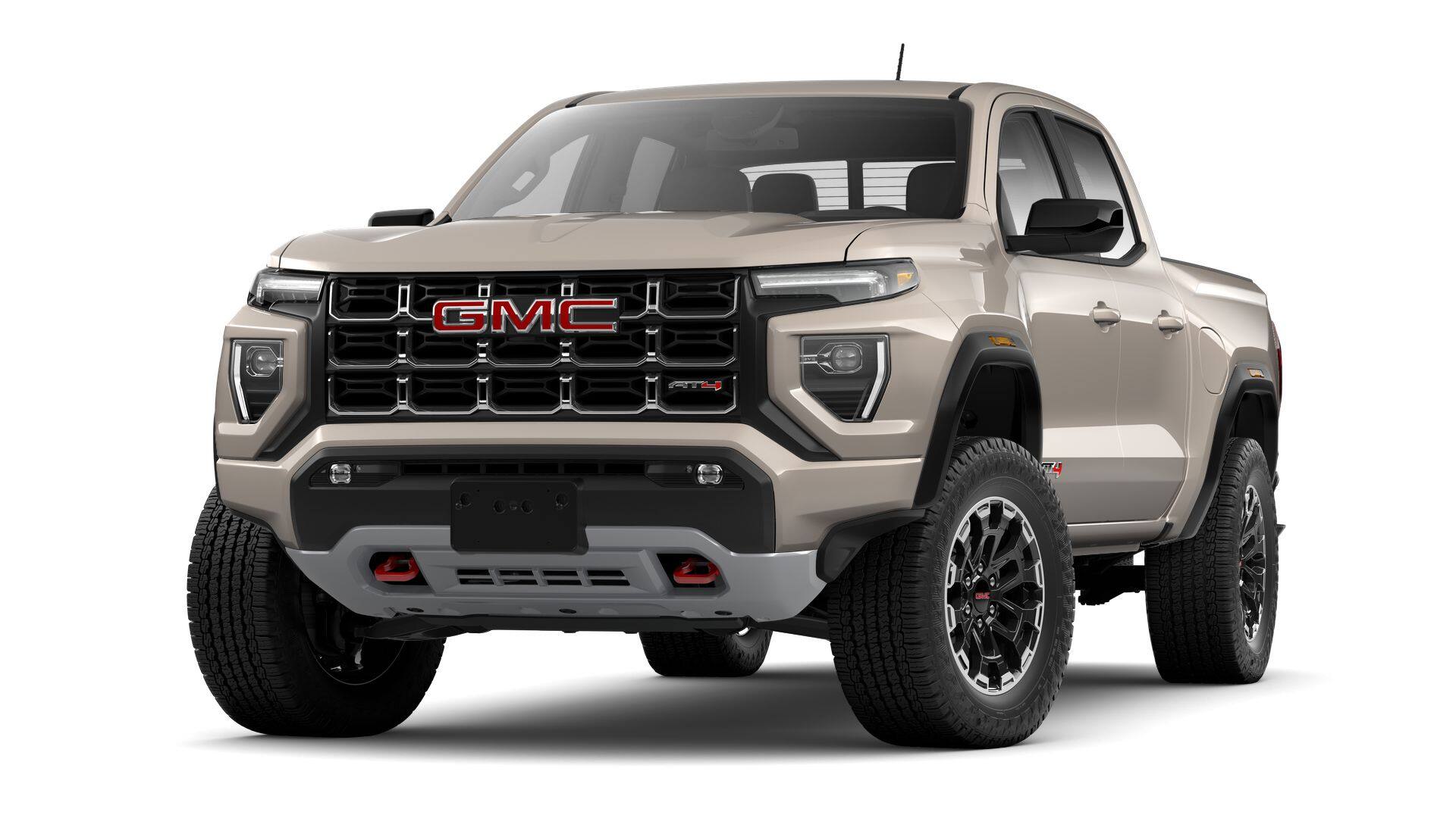 2026 GMC Canyon AT4 in Coastal Dune — front three-quarter view